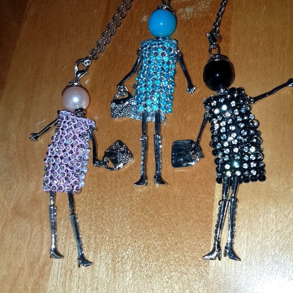 3 Necklaces Glittery/Moveable Doll
